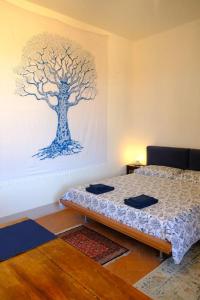 En eller flere senge i et værelse på Suite storica e panoramica - Centro