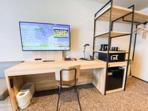 TV a/nebo společenská místnost v ubytování Comfort Hotel Takamatsu