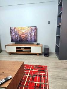 A television and/or entertainment centre at Ready for Move-in! Simface House