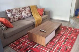 A seating area at Ready for Move-in! Simface House