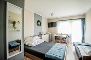 Foto dalla galleria di BENA pokoje i domki a Dziwnówek Altre 87 foto