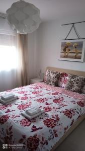 Postel nebo postele na pokoji v ubytování Apartman Bella Vista
