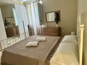 Postel nebo postele na pokoji v ubytování Ely house
