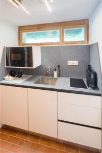 Dapur atau dapur kecil di Hotel Lindenhof by Crossworld AG