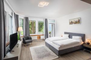 Katil atau katil-katil dalam bilik di Hotel Lindenhof by Crossworld AG