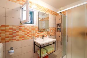 Kúpeľňa v ubytovaní Apartments Panda + 37 fotografií