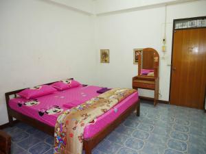 Ένα ή περισσότερα κρεβάτια σε δωμάτιο στο Kim Mansion +3 φωτογραφίες
