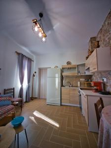 Kuchyň nebo kuchyňský kout v ubytování West Crete House