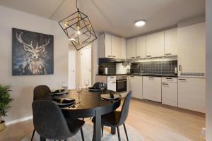 Kjøkken eller kjøkkenkrok på ARCTIC HOMES - The Plaza