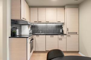 Kjøkken eller kjøkkenkrok på ARCTIC HOMES - The Plaza