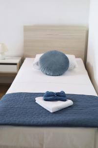 Postel nebo postele na pokoji v ubytování Guesthouse Miranda NP Krka