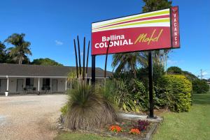 a sign for a ballina colonial motel in front of a building at Ballina Colonial Motel in Ballina