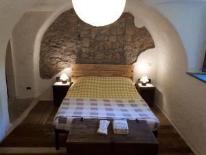 Postel nebo postele na pokoji v ubytování Limone e Peperoncino B&B
