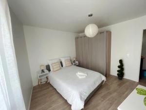 Ένα ή περισσότερα κρεβάτια σε δωμάτιο στο Lovely Flat