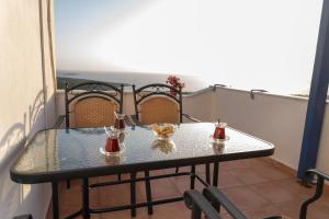 A balcony or terrace at Mastiha luxury maisonette I