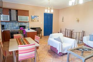A kitchen or kitchenette at Mastiha luxury maisonette I