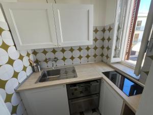 A kitchen or kitchenette at Villa Bianca, Seaside panoramic Rooftop