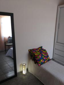 Postel nebo postele na pokoji v ubytování Friendly house in Rio