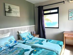 Кровать или кровати в номере Blue Beryl Guest House