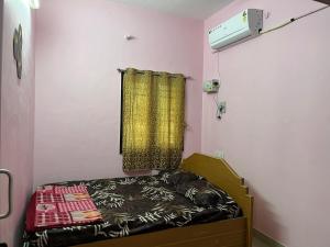 Postel nebo postele na pokoji v ubytování Malar service apartment