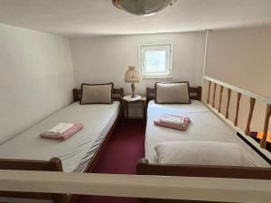 Postel nebo postele na pokoji v ubytování Apartment M