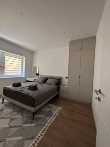 Postel nebo postele na pokoji v ubytování Bascarsija Suite