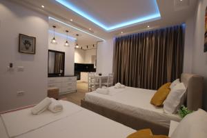 Postel nebo postele na pokoji v ubytování Klea Rooms