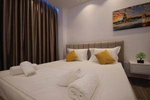 Postel nebo postele na pokoji v ubytování Klea Rooms