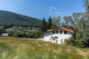 a house on the side of a hill at clos Saint François Spa in Wangenbourg
