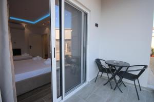 Postel nebo postele na pokoji v ubytování Klea Rooms