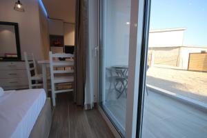 Postel nebo postele na pokoji v ubytování Klea Rooms