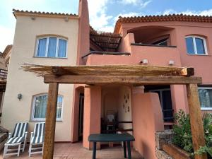 Fotografie z fotogalerie ubytování Villetta a schiera in paradiso v destinaci Isola Rossa