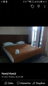 Voodi või voodid majutusasutuse RF Hotel toas