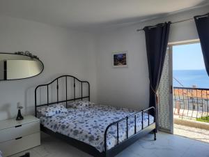 Ένα ή περισσότερα κρεβάτια σε δωμάτιο στο Krstino