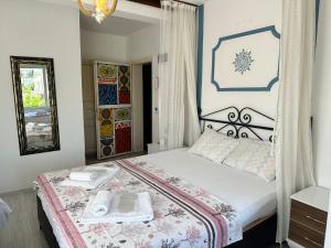 Кровать или кровати в номере Bonjourla Otel