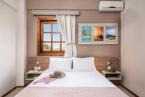 Llit o llits en una habitació de Cathrin Suites 40 fotos més