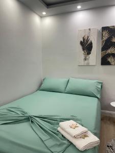 Postel nebo postele na pokoji v ubytování Shtepi Pushimi Xhoi