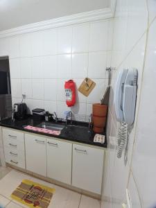Dapur atau dapur kecil di Quarto em Apto Compartilhado Bem Localizado AP 204 +3 gambar