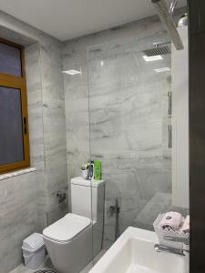 Koupelna v ubytování Shtepi Pushimi Xhoi + 4 fotografie