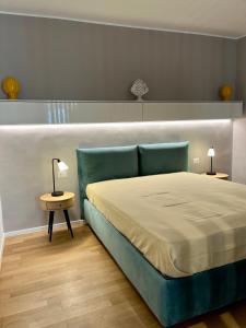 Postel nebo postele na pokoji v ubytování Loft House Bari