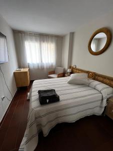 Postel nebo postele na pokoji v ubytování Acogedor y Amplio Apartamento familiar a pie de playa