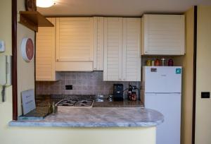 A kitchen or kitchenette at Casa Vacanze Diamante