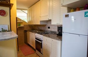 A kitchen or kitchenette at Casa Vacanze Diamante