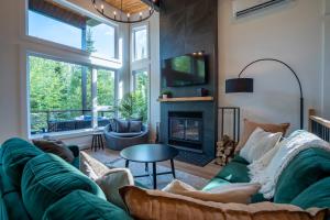 Χώρος καθιστικού στο Évasion Nature Adstock - Sauna, Ski & Spa