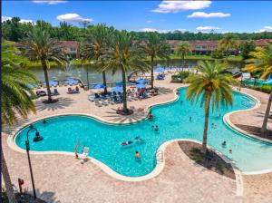 an overhead view of a swimming pool at a resort at Camaro in Orlando