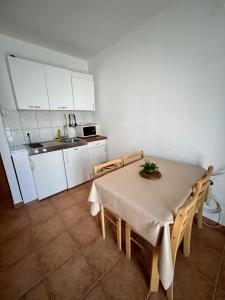 Kuchyňa alebo kuchynka v ubytovaní Melita Apartements