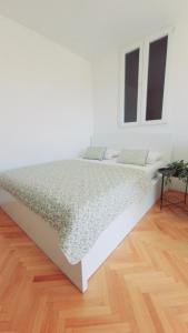 Posteľ alebo postele v izbe v ubytovaní Apartment Pavle