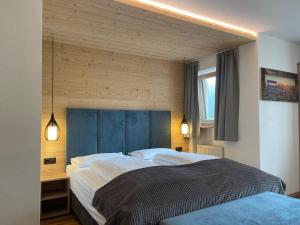 Postel nebo postele na pokoji v ubytování Guesthouse Rungg