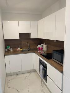 Kuchyň nebo kuchyňský kout v ubytování R3 Cozy Msida for 2 with Twin Beds