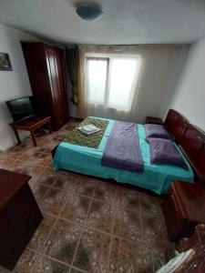 Giường trong phòng chung tại Casa Anca +3 ảnh